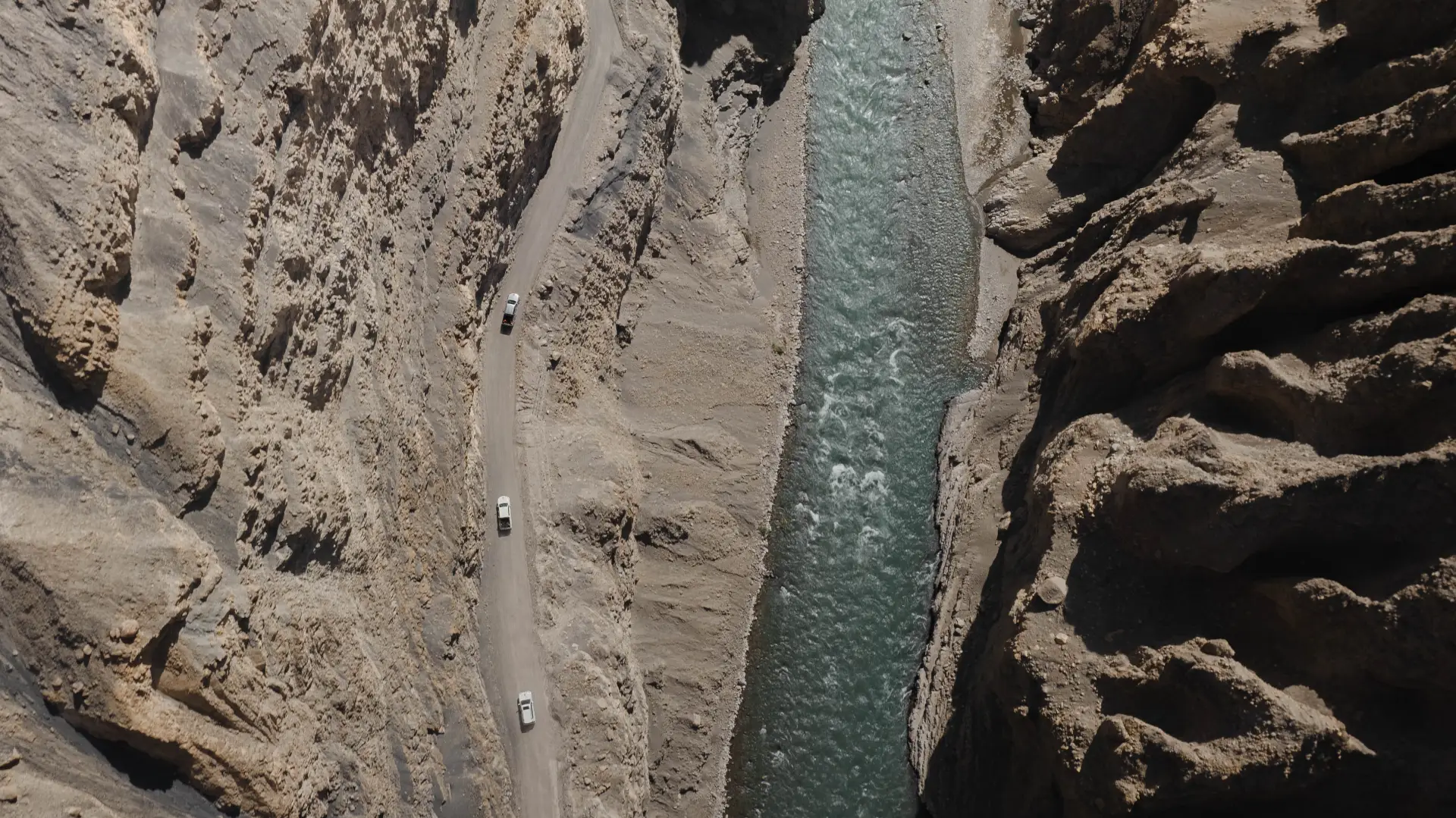 A car in the middle of great mountain landscape during a Nomadic Road expedition