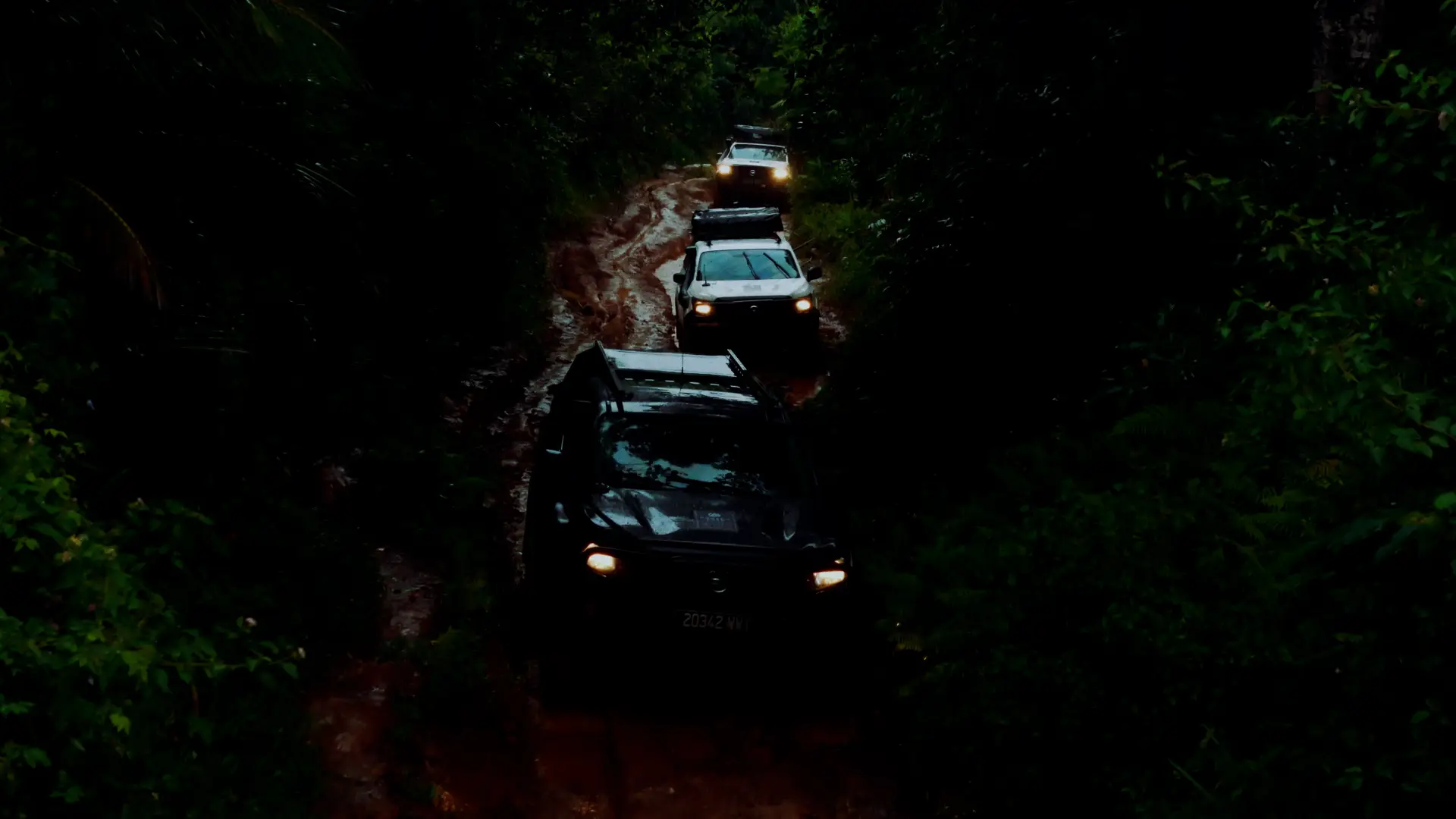 Group of car traveling in a snow landscape