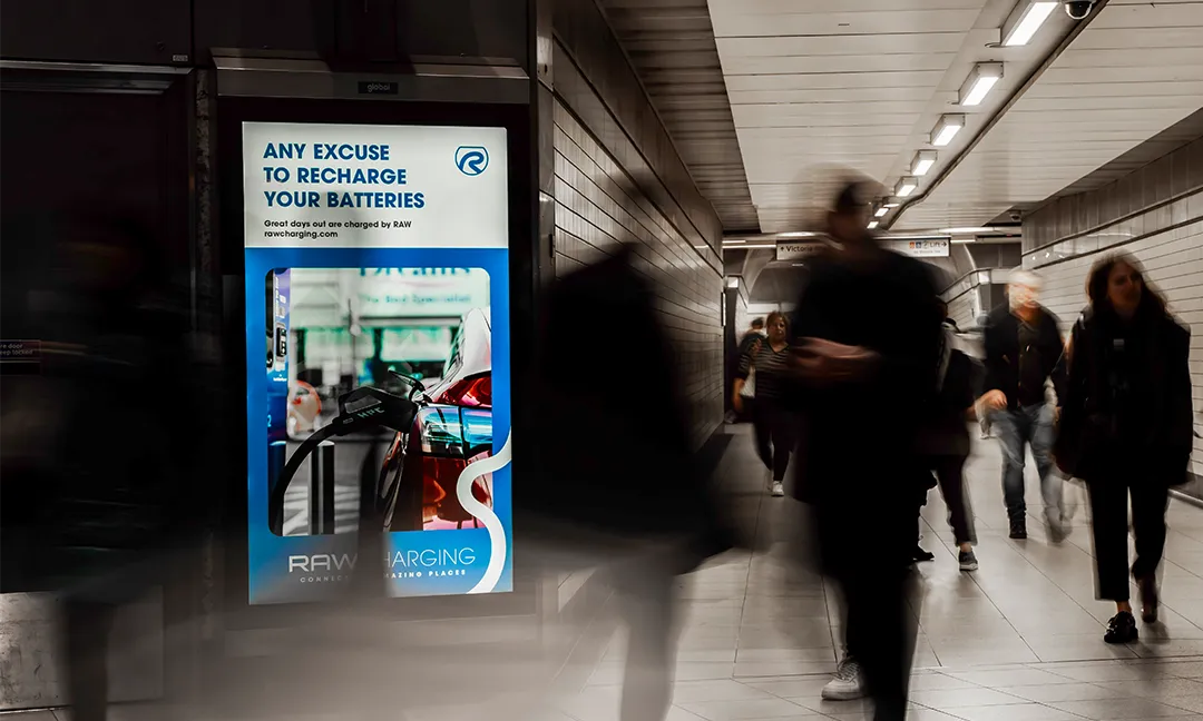 RAW Charging platform display at Bank Underground station showcasing EV charging benefits
