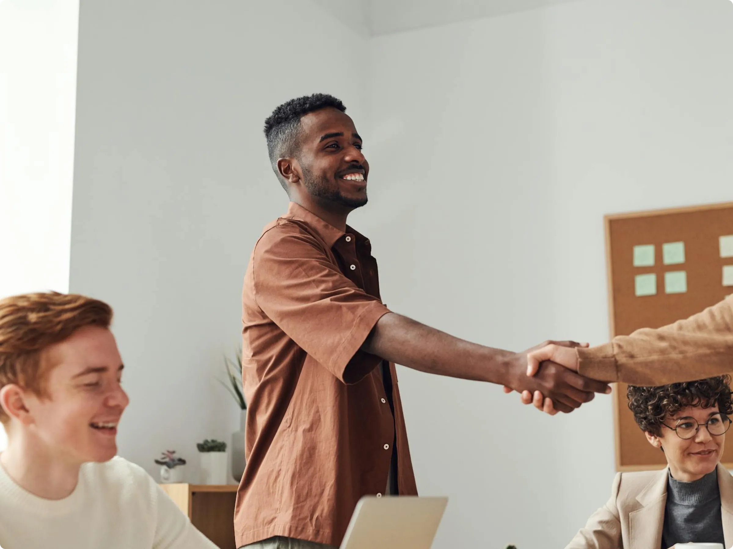 Hand shake between employees