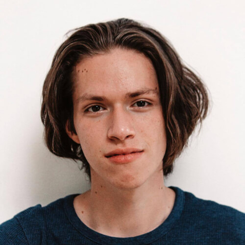 man in blue crew t-shirt