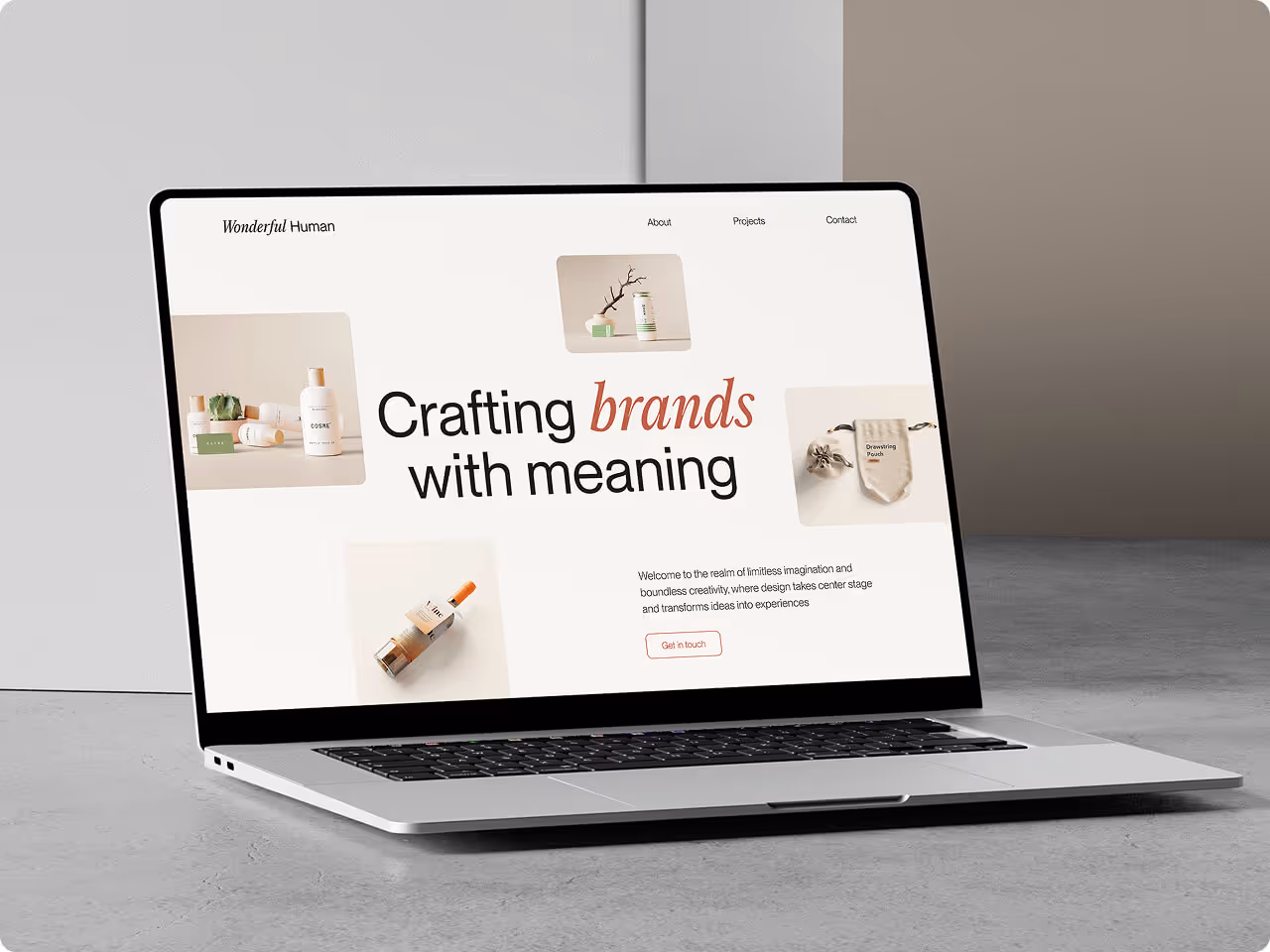 A laptop displaying a designer portfolio template made in Wefblow