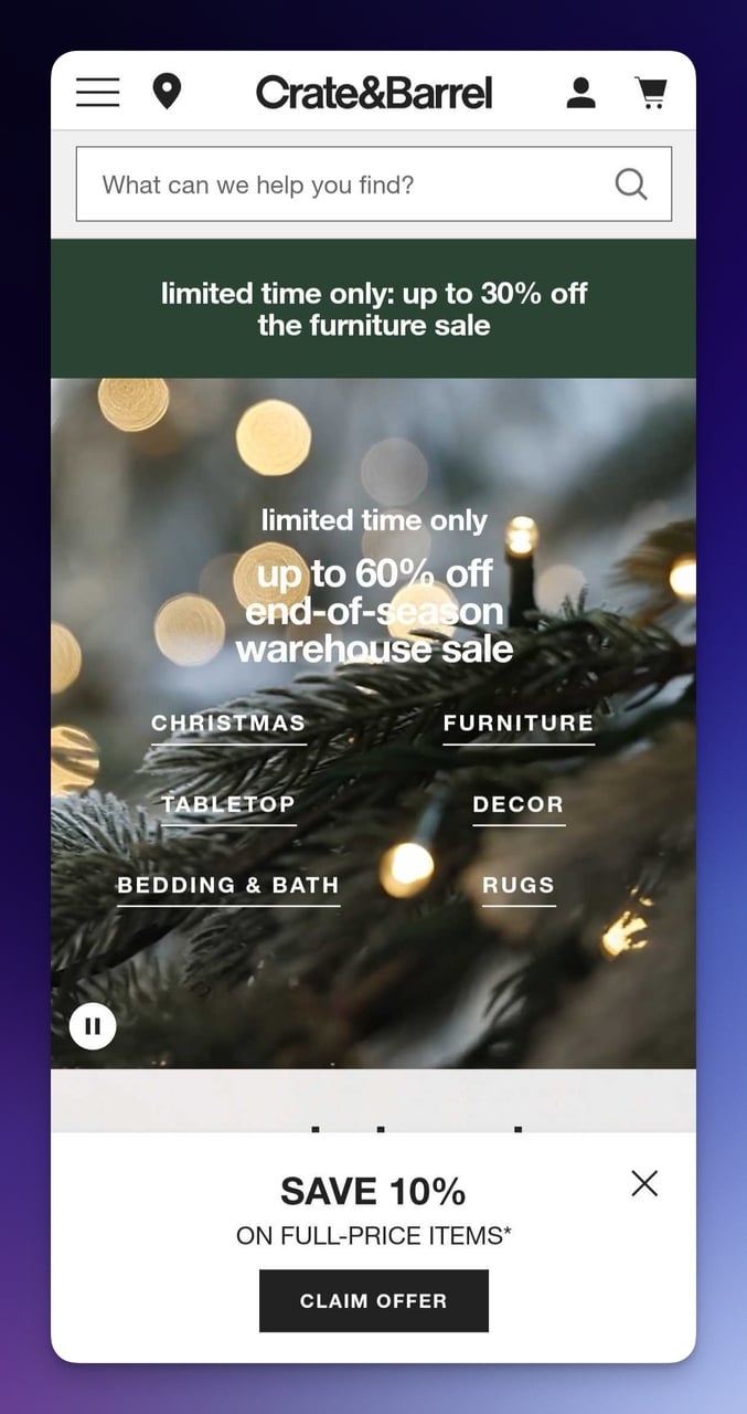 Crate and Barrel mobile landing page example with lifestyle imagery and category navigation