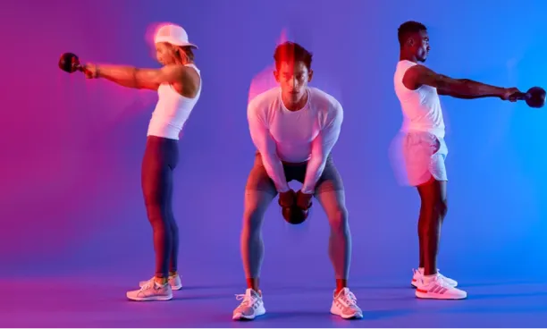Three people exercising with kettlebells against a gradient pink and blue background, performing swings and squats.