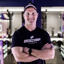 Mitch is our head coach and has been coaching with Basecamp since 2019. Since then, he’s coached thousands of classes and told thousands of mediocre dad jokes. He has a degree in exercise science and developed a passion for fitness during his time with the Marines. Mitch loves Basecamp for the team aspect that comes from a fitness community working to better themselves and each other. Outside of the studio, Mitch spends time with his wife Paige and their two kids. If Mitch doesn’t have a dumbbell in his hand, he’s holding a beer from a Twin Cities brewery—sometimes one in each hand.