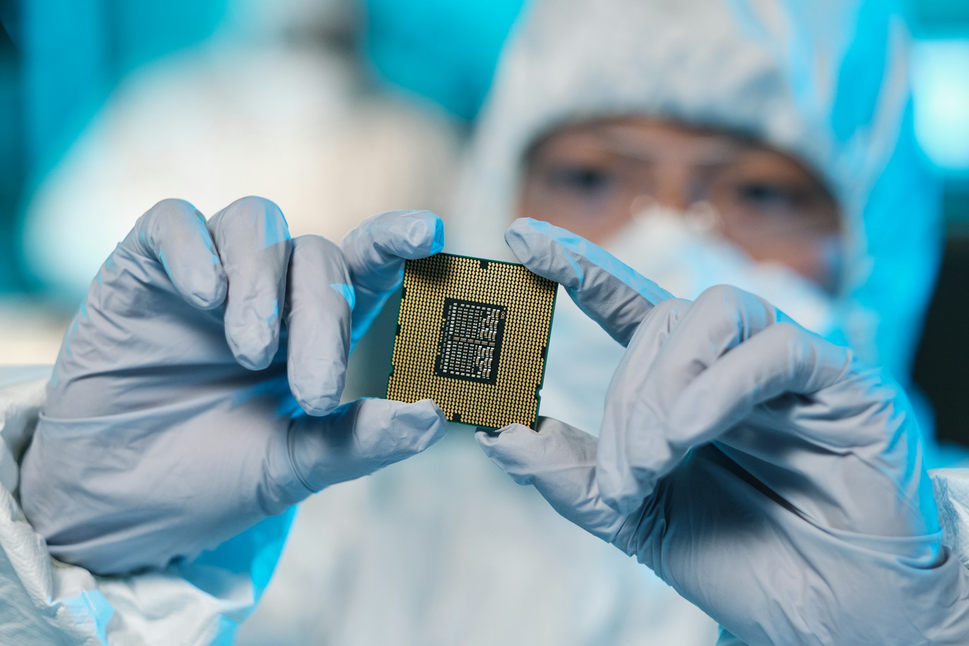Scientific holding a semiconductor with his hands