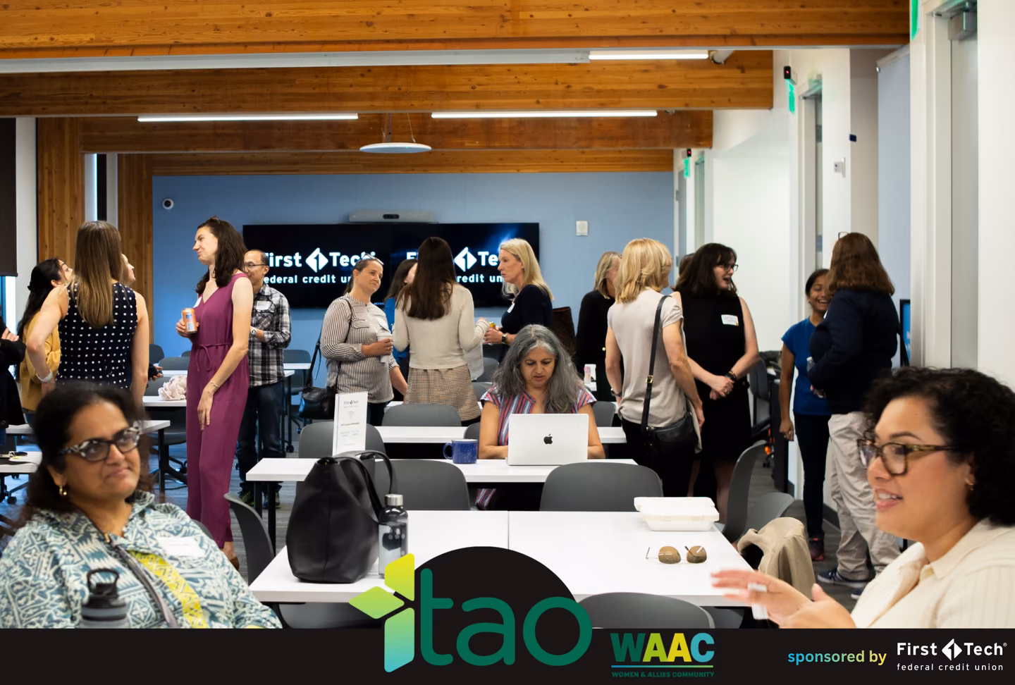 Attendees mingling at the TAO WAAC Beyond the Build event at First Tech in Hillsboro