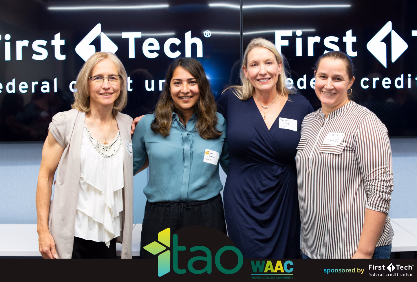 Beyond the Build panelists and moderator posing in front of First Tech Federal Credit Union screens