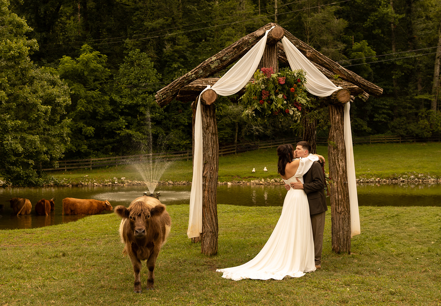 Guests dancing at reception at Satolah Creek Farm wedding venue in North Georgia