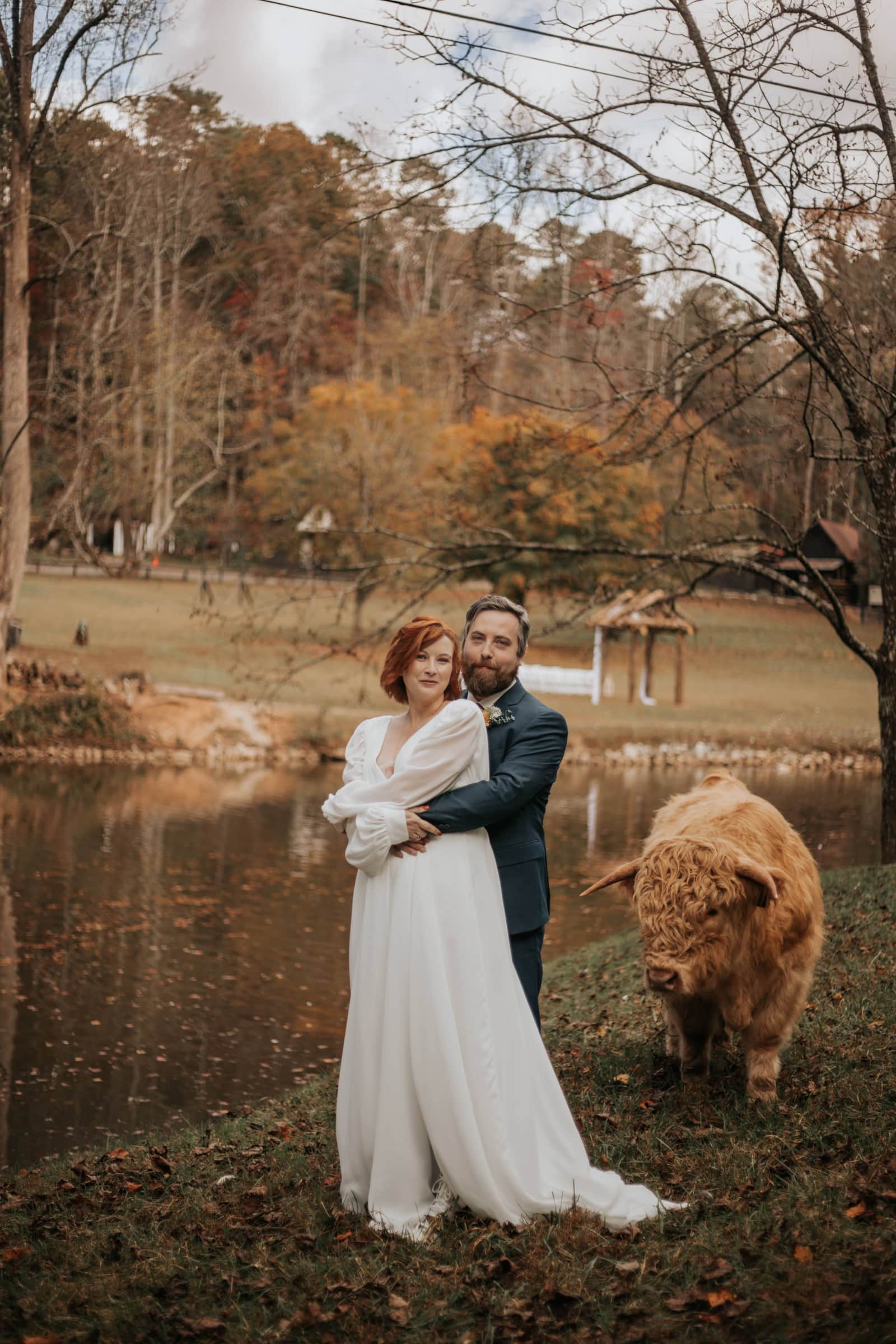 North Georgia farm wedding venue couple standing in farm pasture