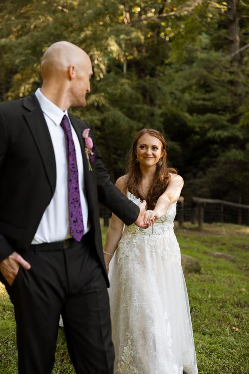 Petting donkeys at Satolah Creek Farm wedding venue in North Georgia