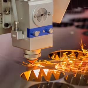 Close-up of industrial laser cutter head