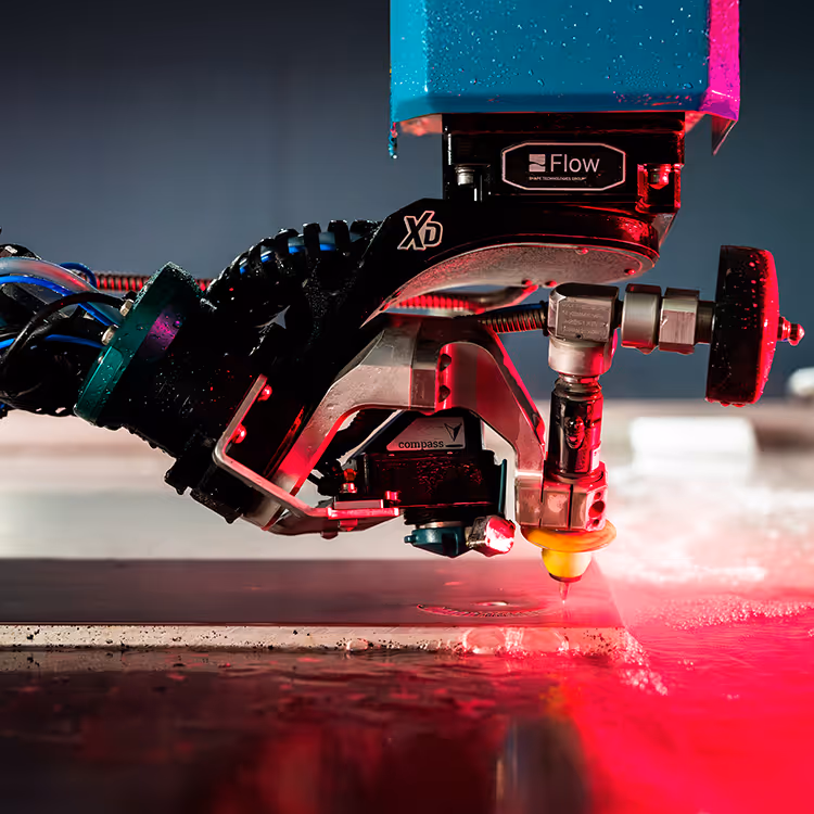 An action shot of a high precision Water jet machine part of the range of water jets we have for sale