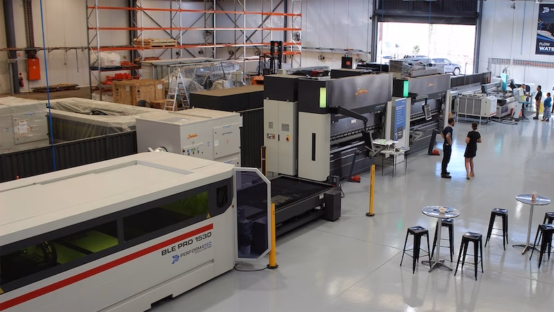 Water jet cutter Mach 150 in action on metal