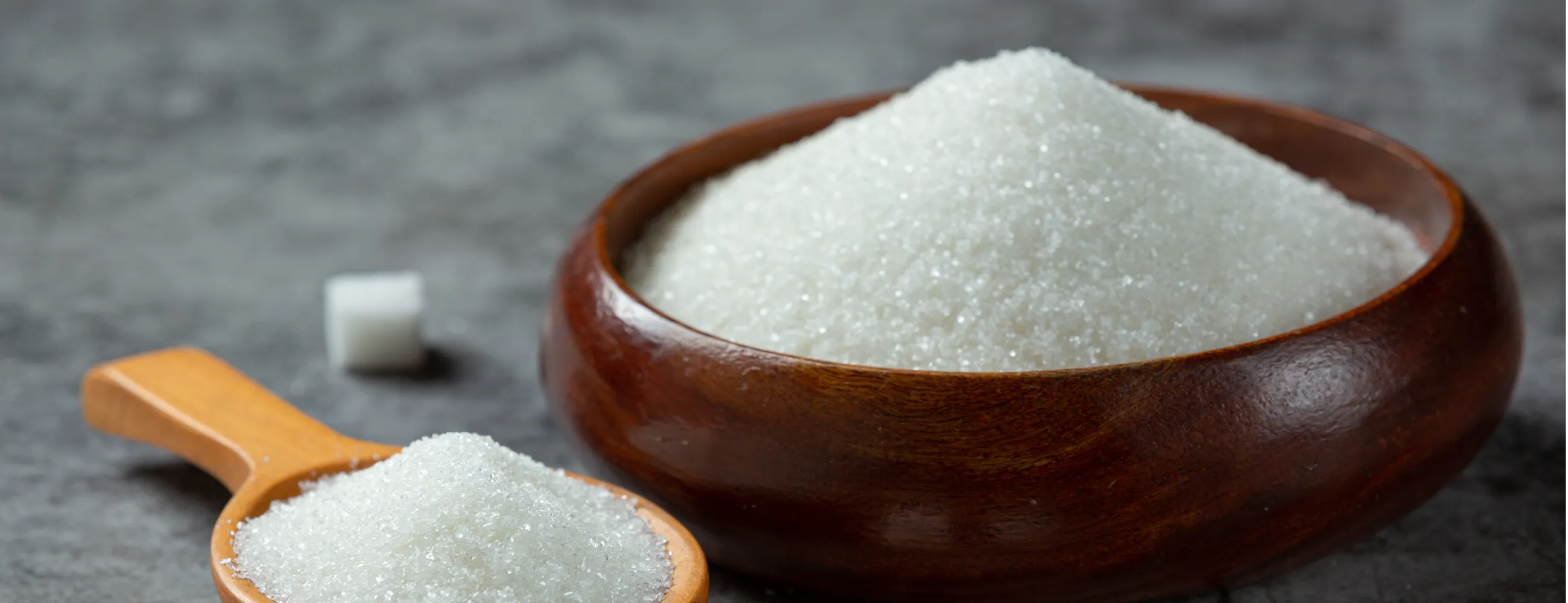 A bowl filled with Ukrainian-made sugar, promoting local products