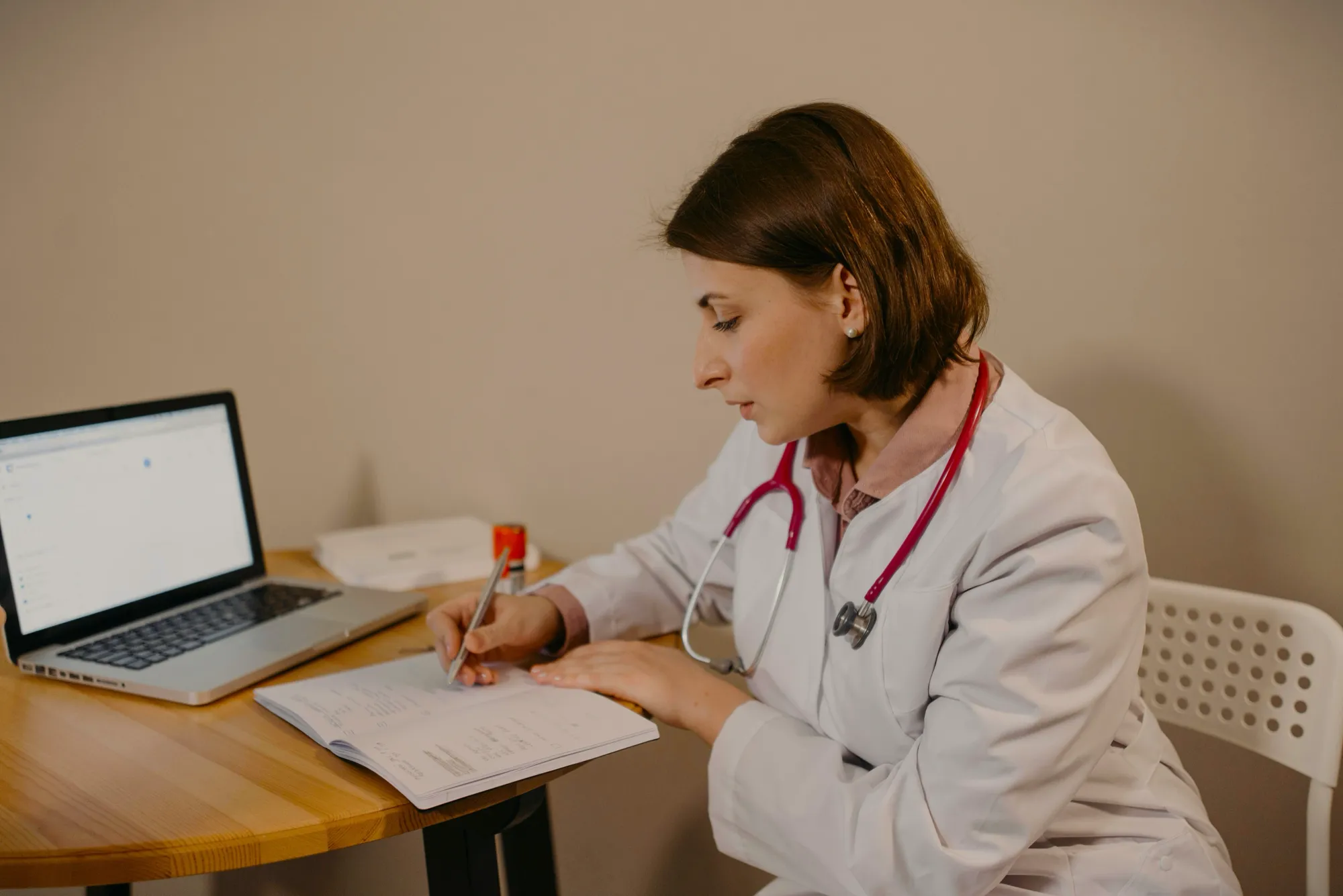 A doctor discusses important health matters with a patient in a clinical setting medicaid.