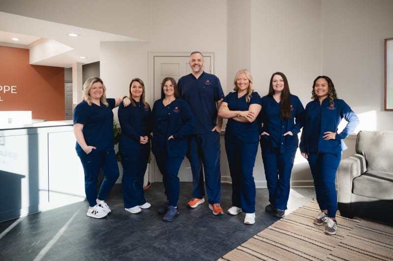 Lagniappe Dental Team posing for a group photo at the office. 