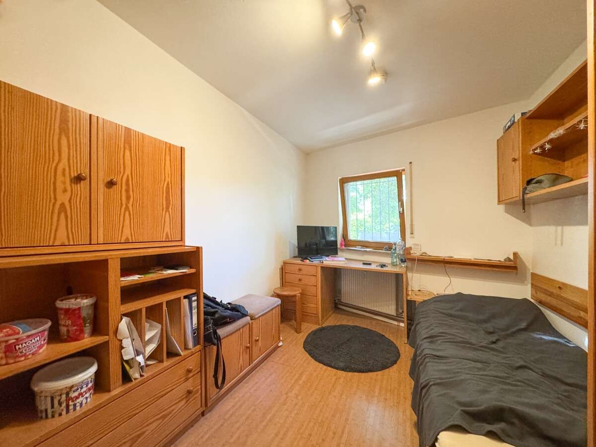 Schlafzimmer im Erdgeschoss – Mehrfamilienhaus in Worms