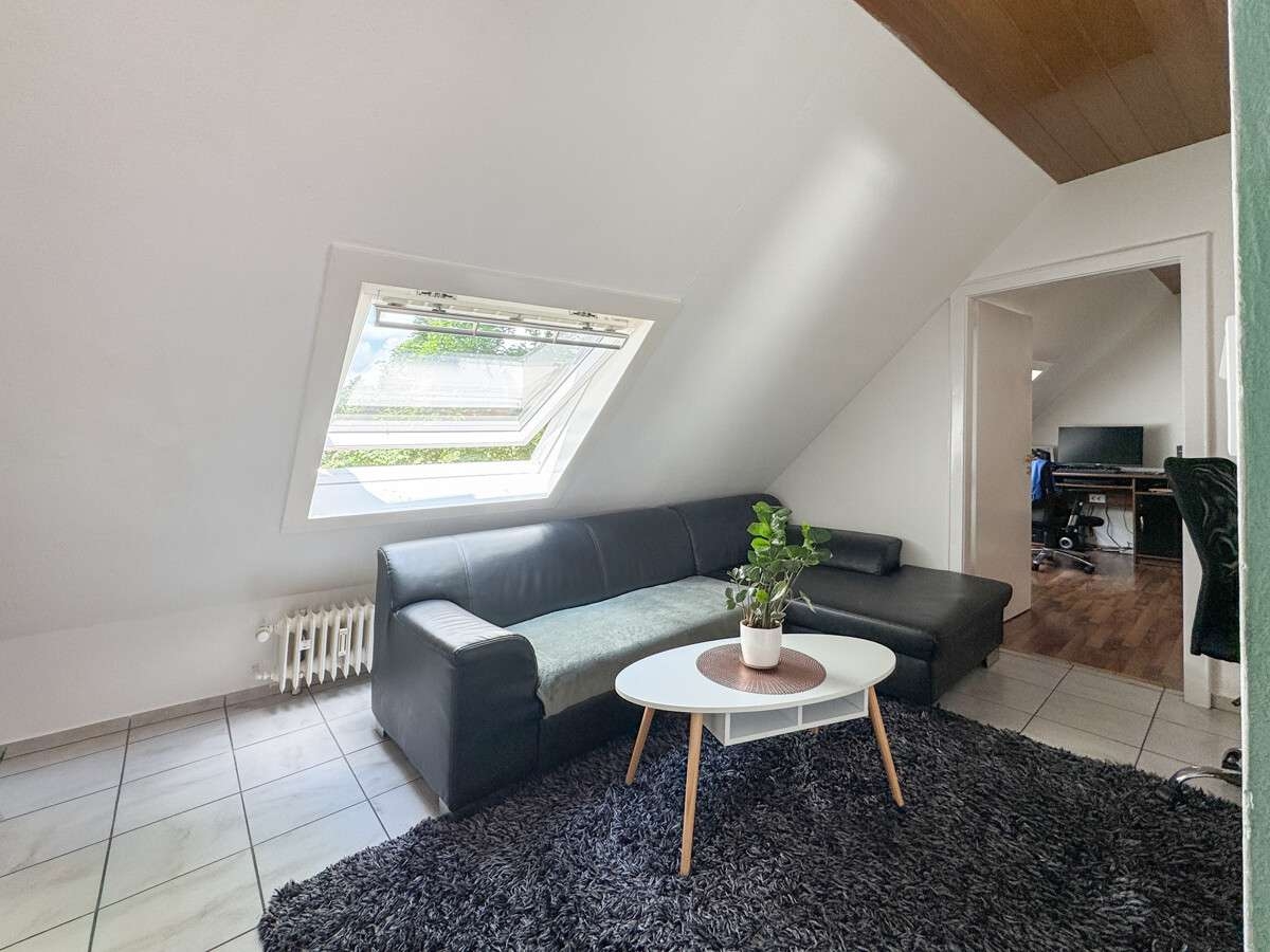 Durchgangszimmer im Dachgeschoss – Mehrfamilienhaus in Worms