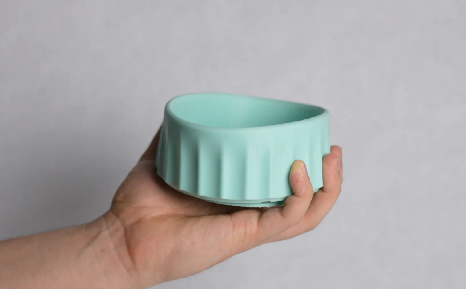 Silicone prototype held in hand