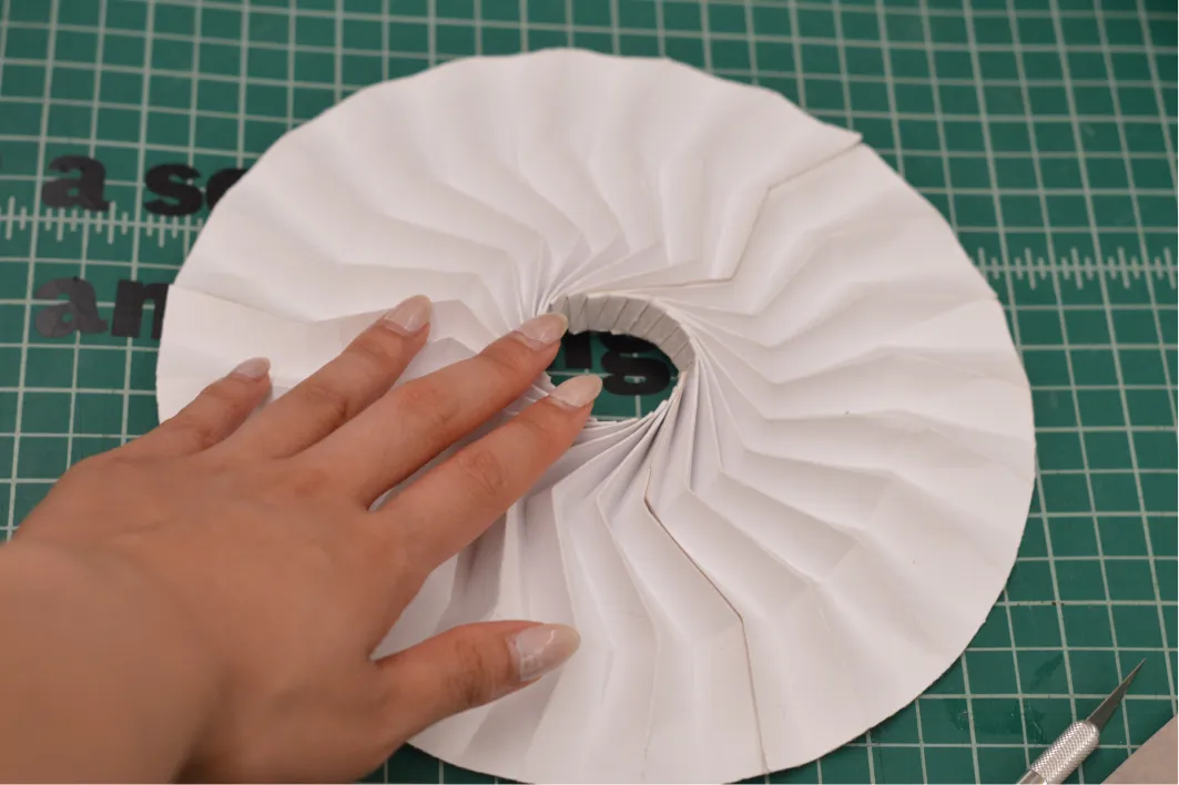 Flattening a paper fold pattern