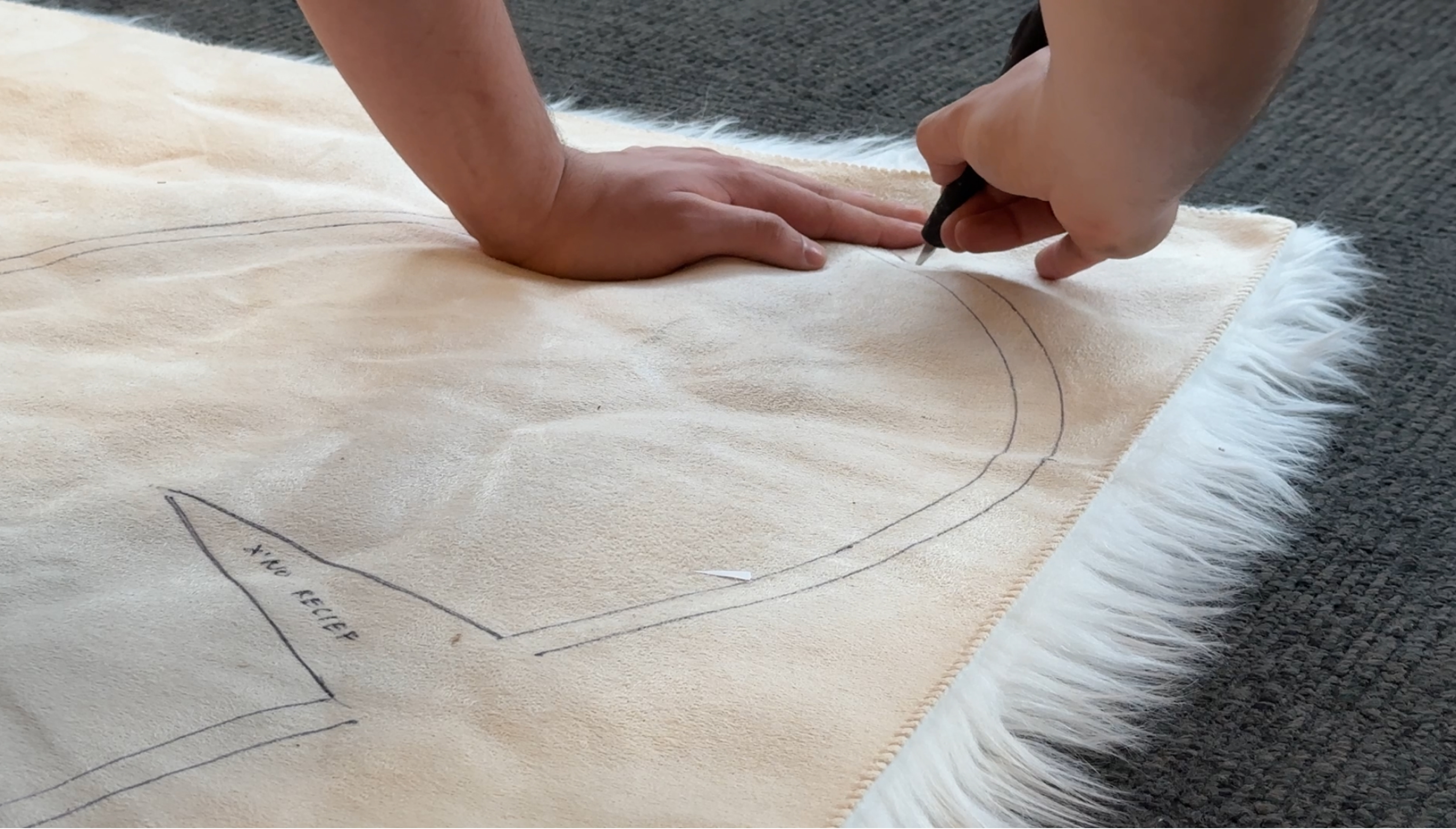 Tracing the seat pattern on faux sheepskin
