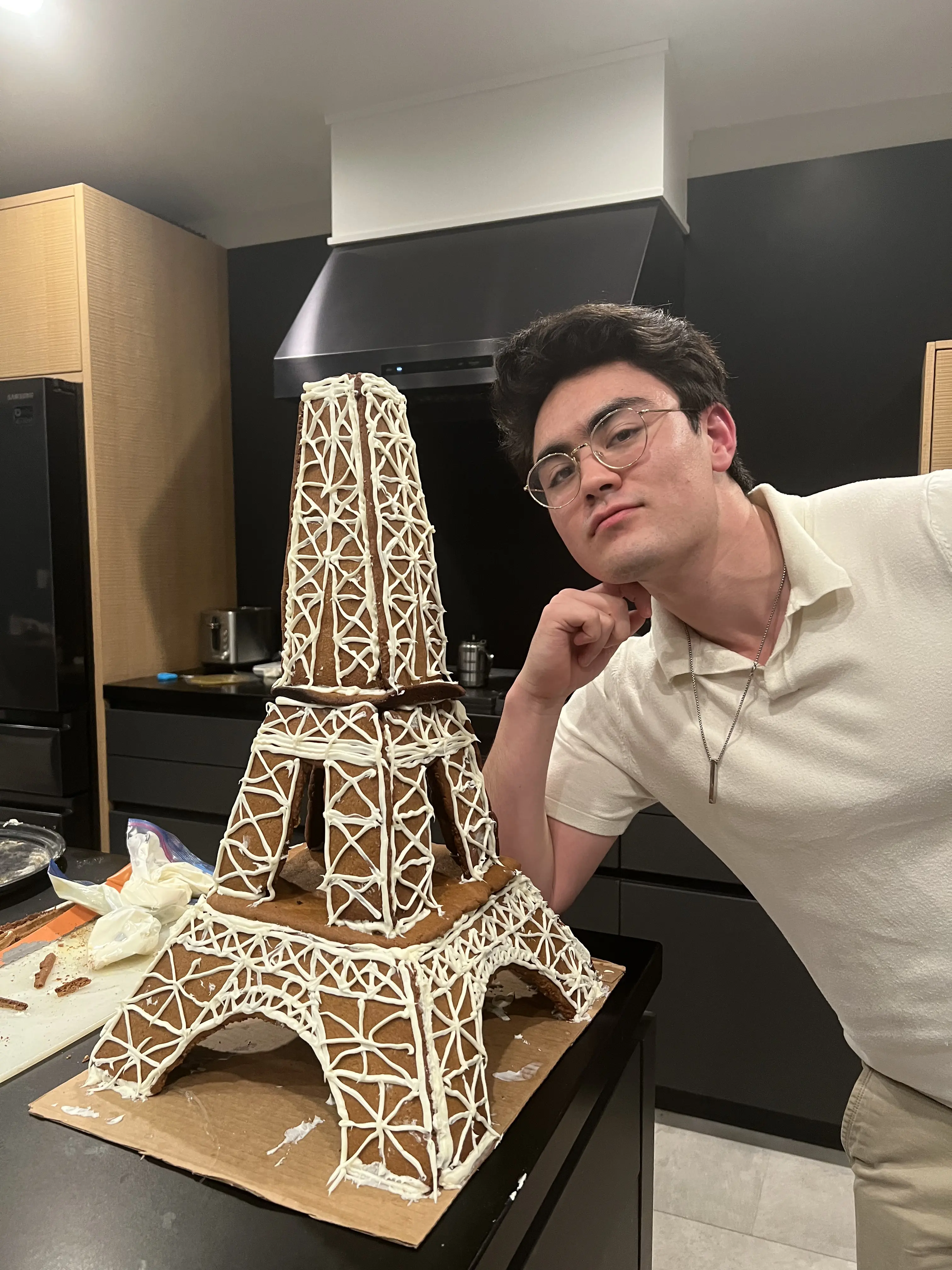 Kyle with a gingerbread Eiffel Tower