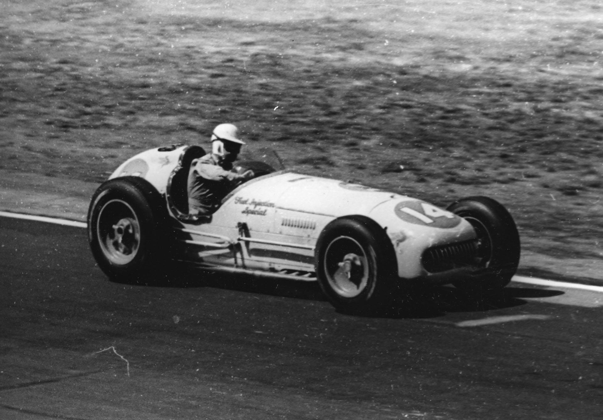 Historic Offenhauser-powered Indianapolis race car on track