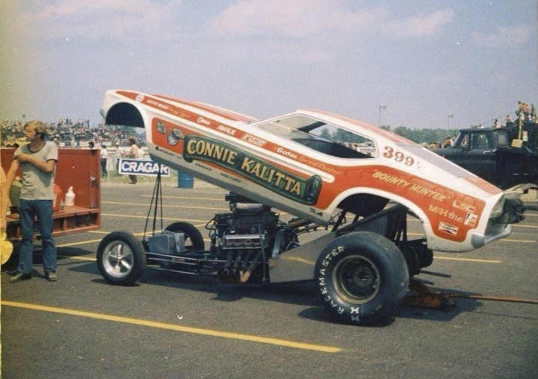 Connie Kalitta's number 399 Funny Car raised above its Keith Black-powered engine