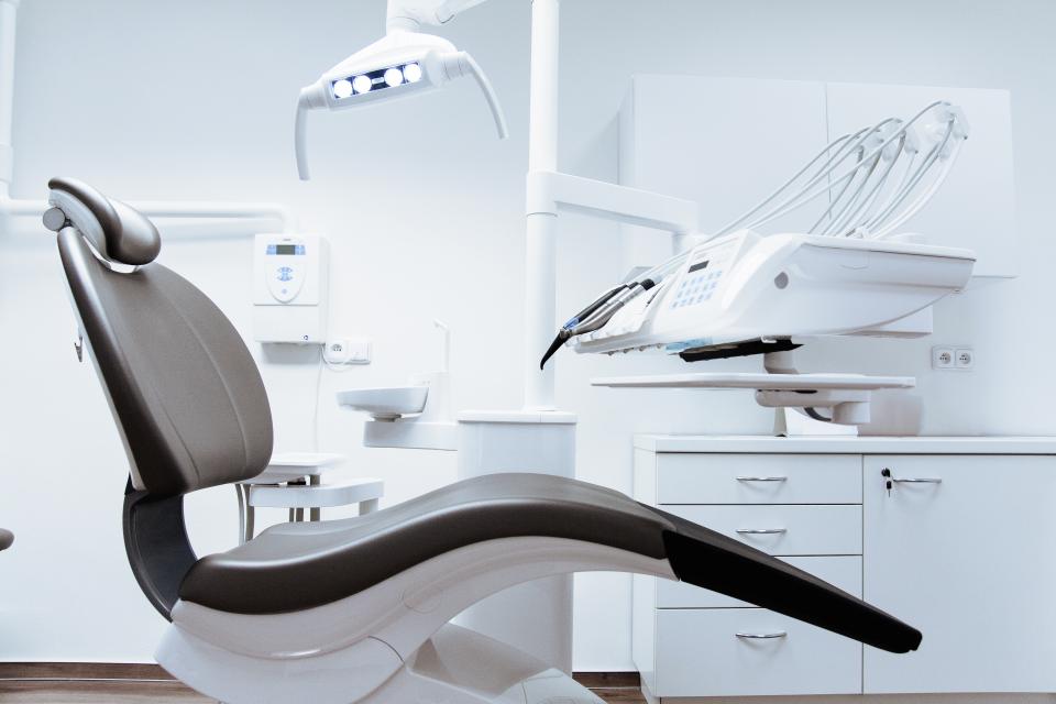 Dental chair and equipment in a clean treatment room