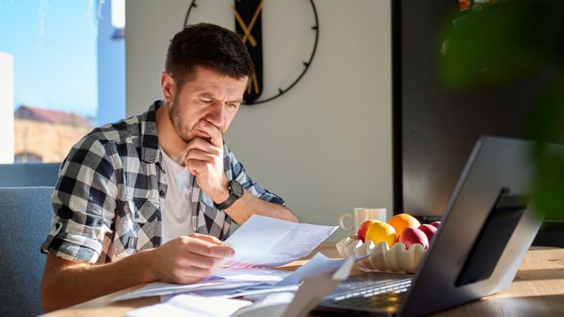 California employee reviewing separation documents after being fired or laid off