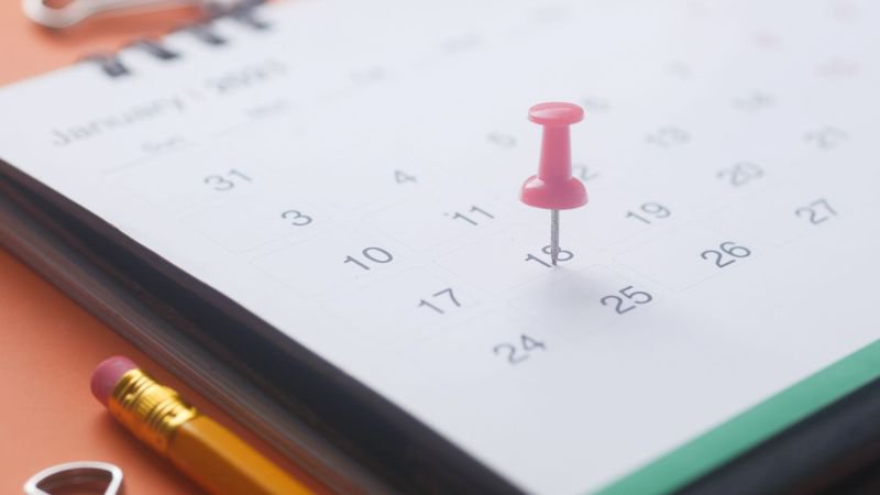 Calendar with pinned deadline date representing California final paycheck law waiting time penalty clock