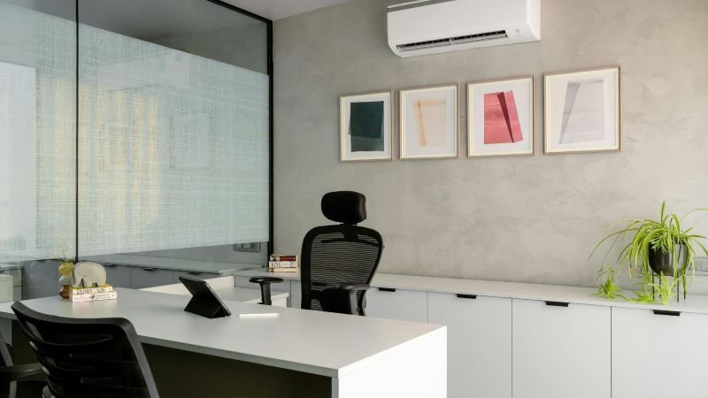 A clean, empty office with no personal belongings, representing the aftermath of a job termination or layoff in California