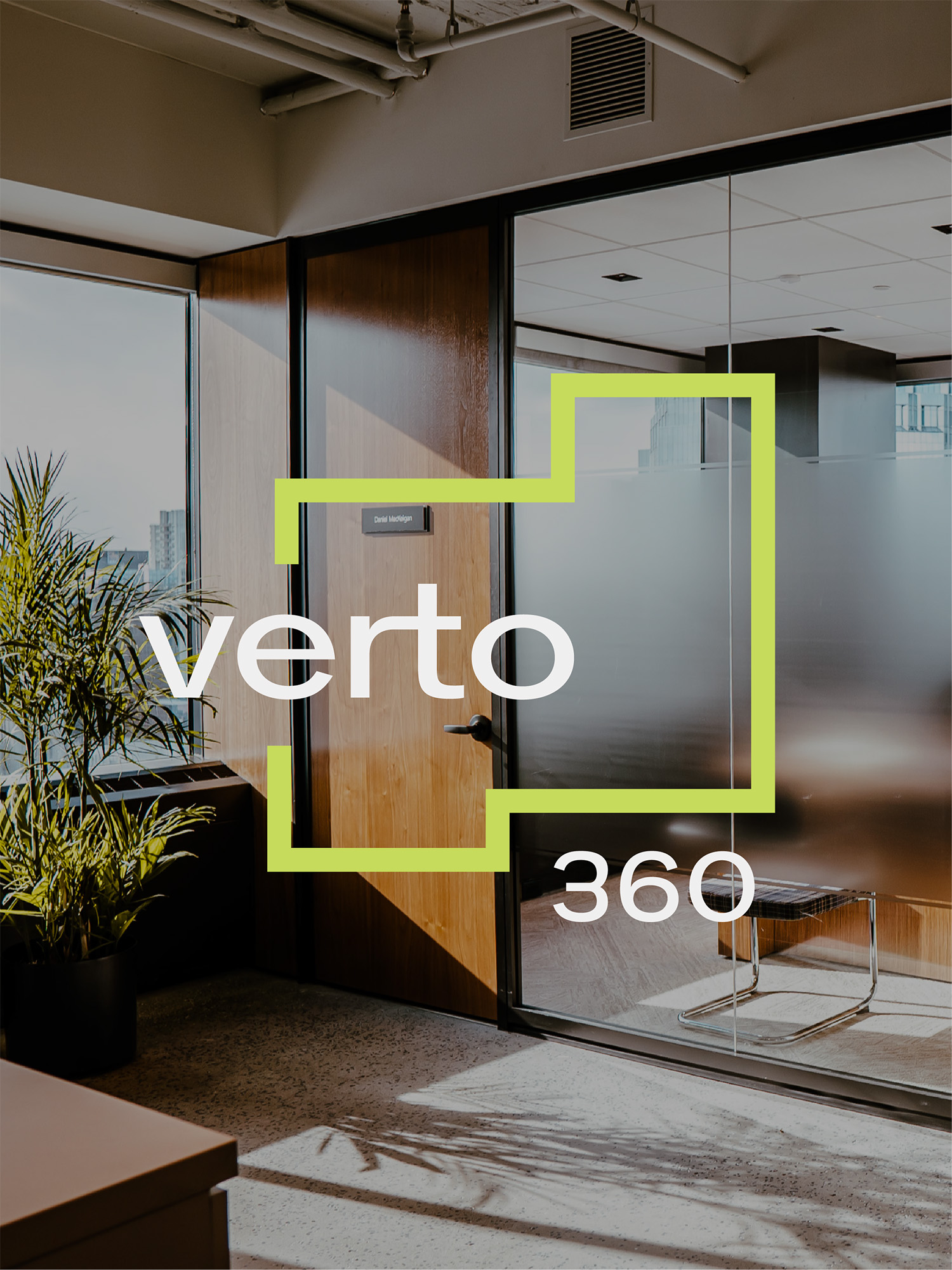 Verto360 logo overlaid on image of modern office space with glass windows and doors