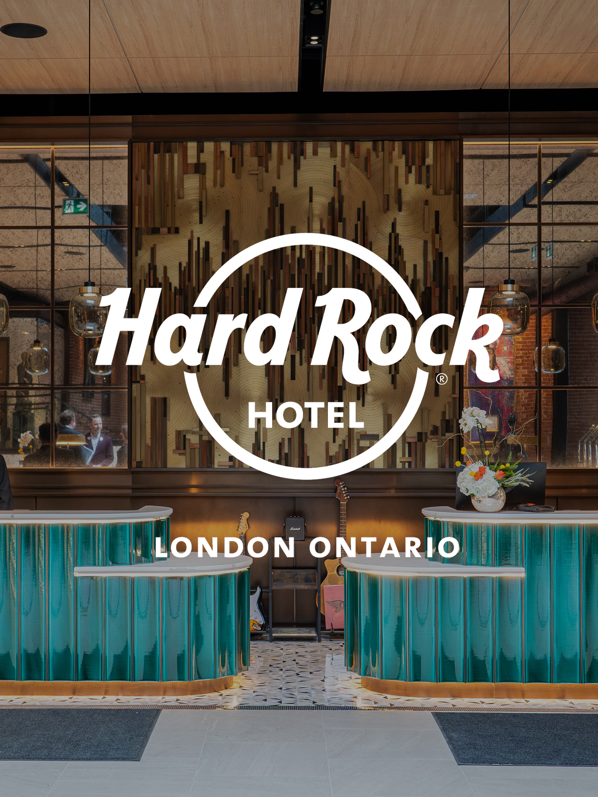 White Hard Rock Hotel London Ontario logo on image of hotel lobby