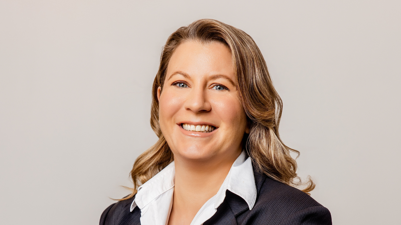 Lady drinking tea at computer