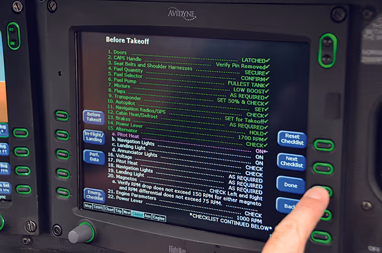 Digital avionics display showing pre-flight checklist before takeoff.
