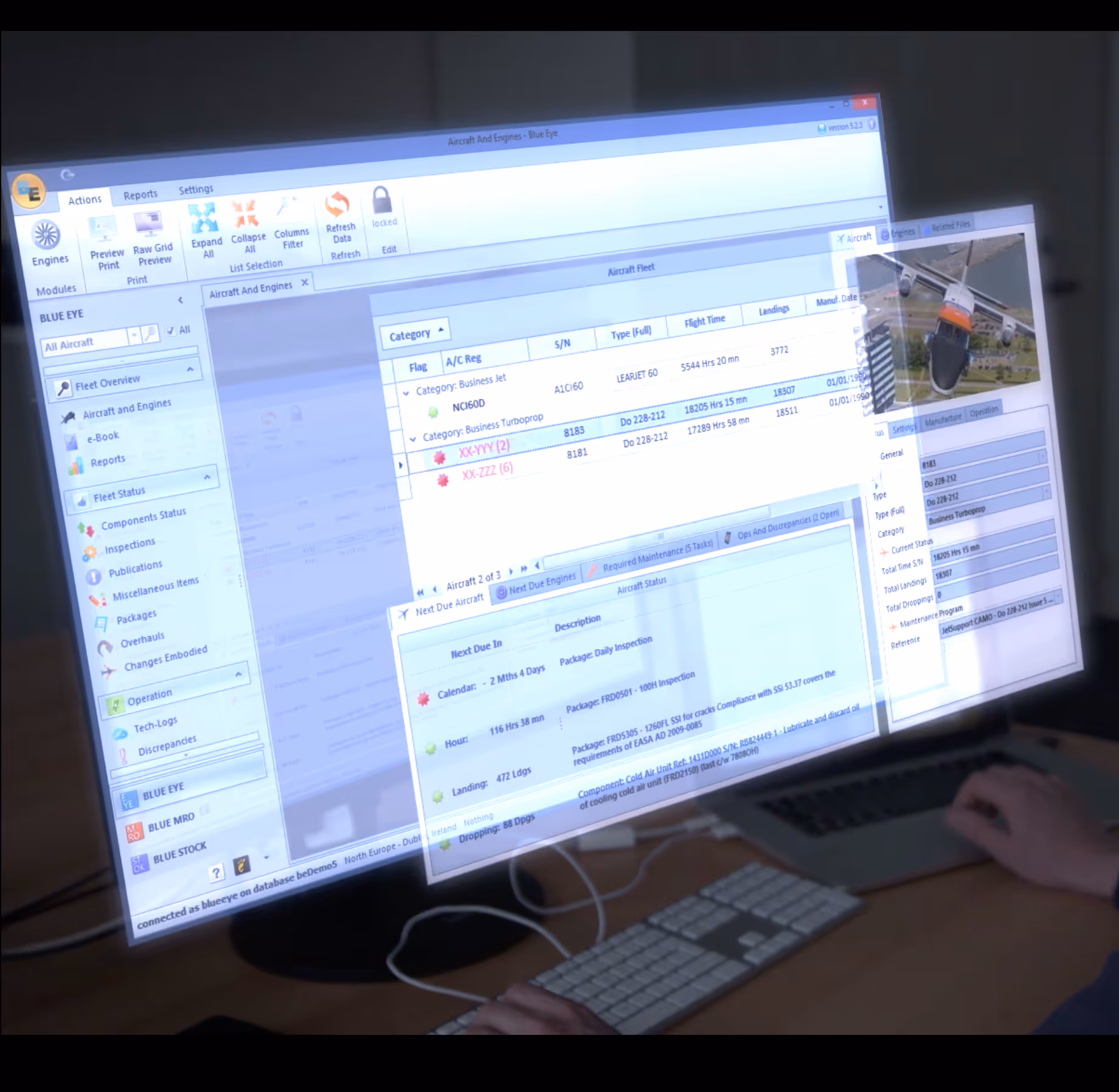 Computer screen showing aviation maintenance management software for aircraft fleet monitoring.