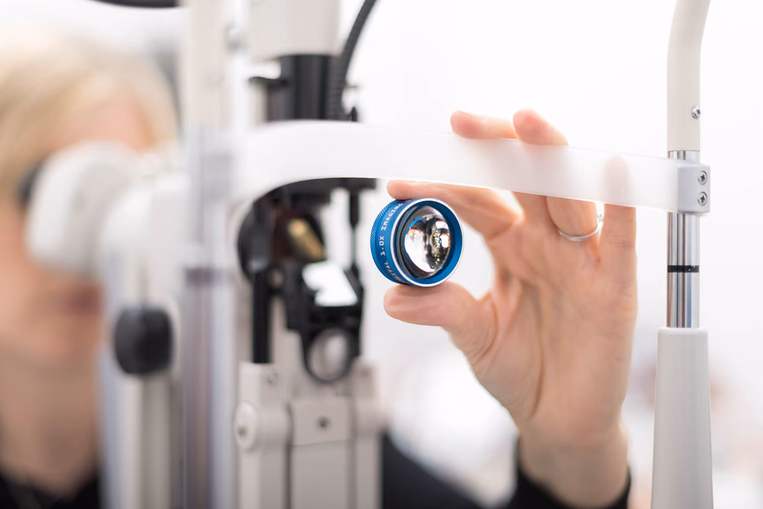 Optiocian carrying out eye test
