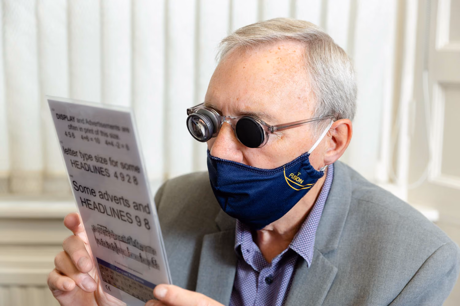 Man at local opticians for an emergency eye care appointment