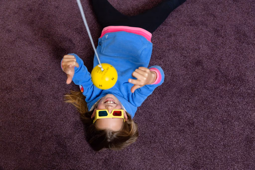 Young Girl Laying on The Floor