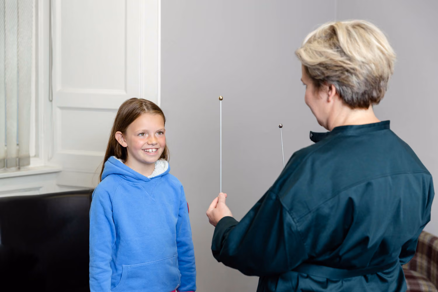 Young girl having an eye test
