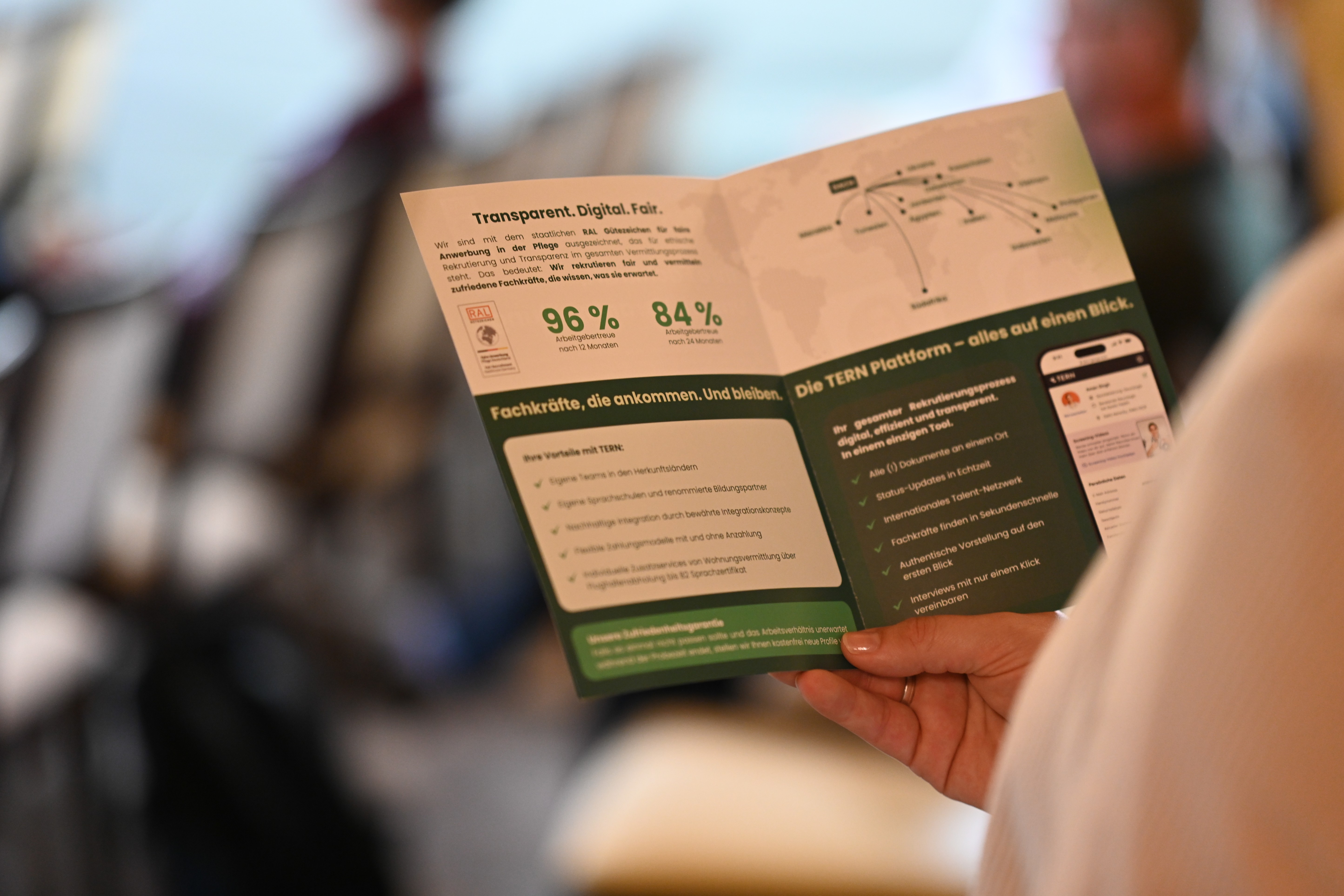 Person holding a TERN Group Germany flyer