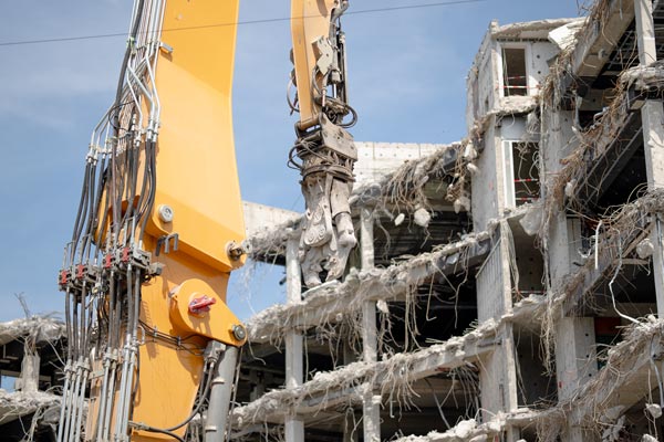 Demolition excavator at construction site