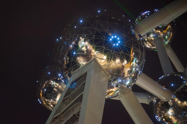 Illuminated Atomium spheres at night in Brussels