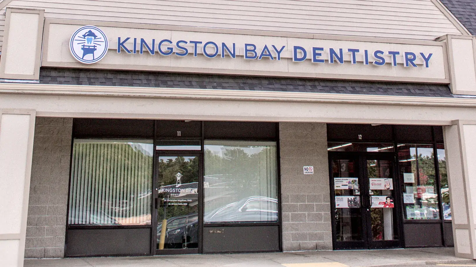 Front view of Kingston Bay Dentistry office with their sign above the entrance.