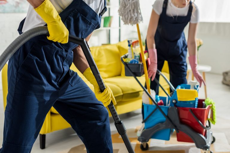House cleaning services Cheektowaga NY team sanitizing living room