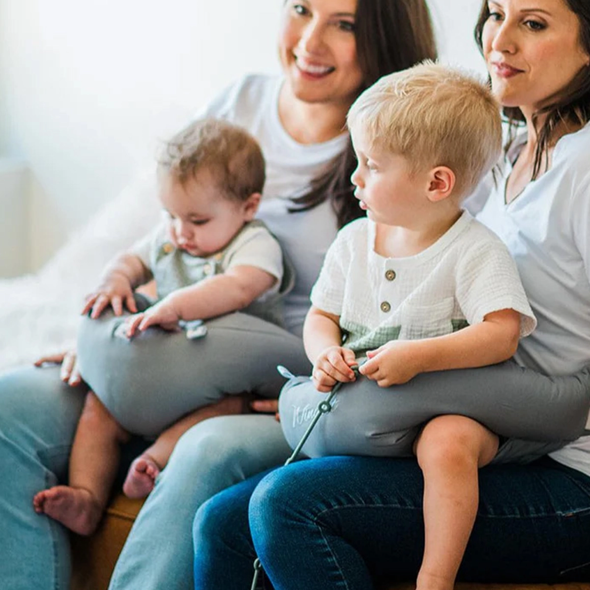 Winglet pillow size range showing adjustable fit for different infant ages and sizes