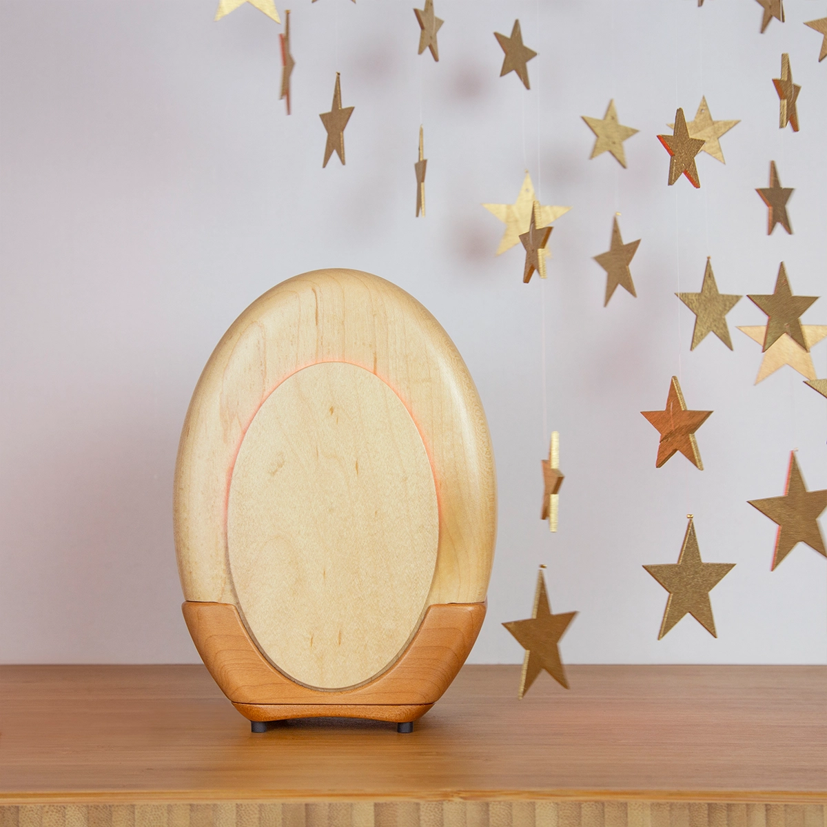 Kulala baby sleep lamp rounded maple form — consumer product designed by Spitfire Industry with no visible hardware or fasteners