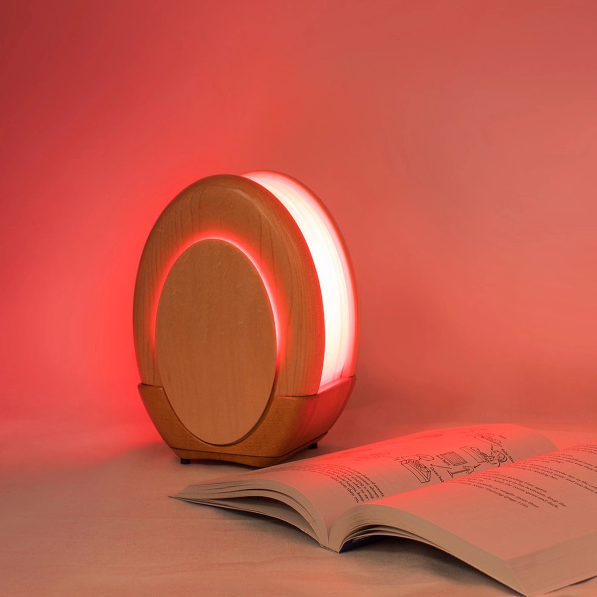 Kulala sleep lamp in a dark nursery emitting red light, designed to support infant sleep without disrupting circadian rhythms